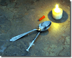 Heroin syringe and spoon